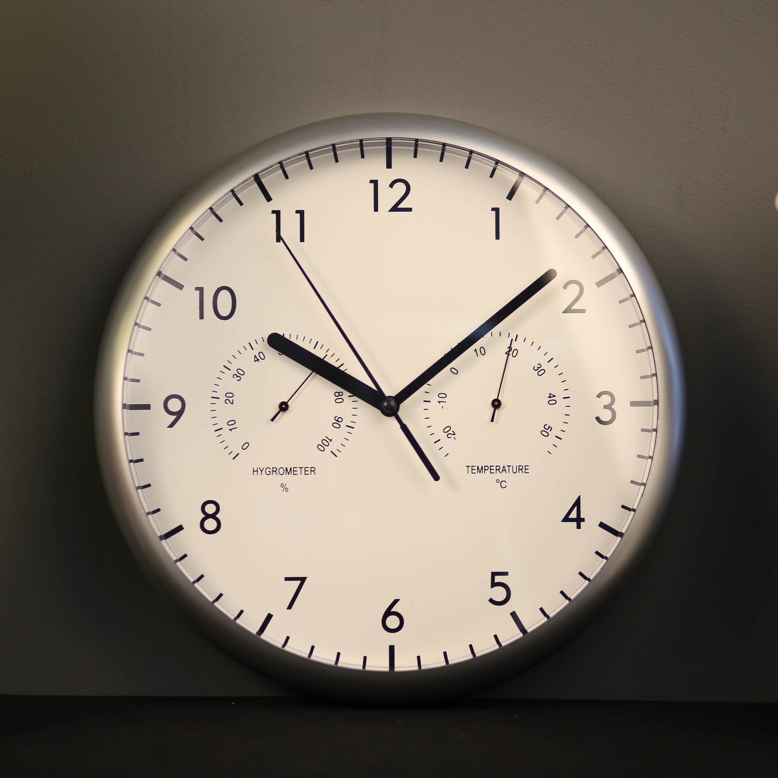 Silver TFA Pendulum Wall Clock 